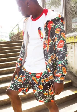 NUEZZZ EiGHT ARMS All-Over Print Shorts