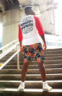 NUEZZZ EiGHT ARMS All-Over Print Shorts